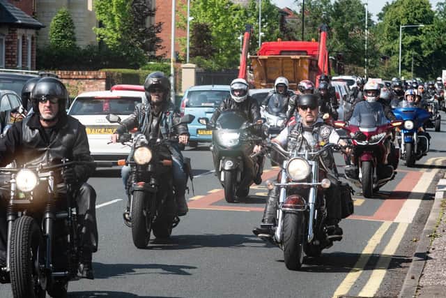 Bikers join the procession to the crematorium for the funeral of Paul Pearson.