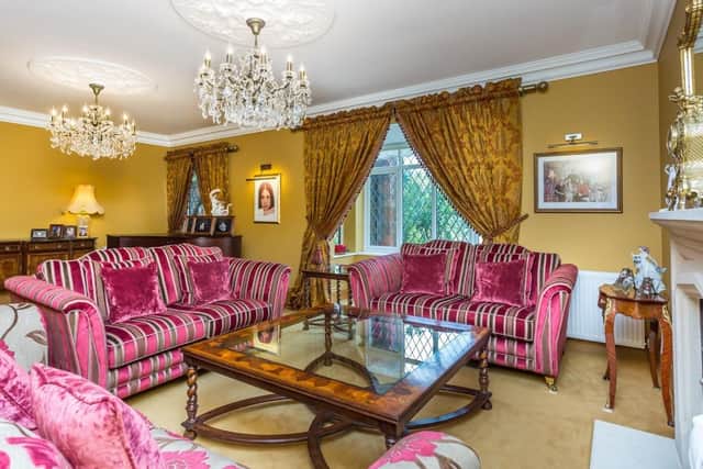 The home's sitting room has its own living flame coal effect gas fire.