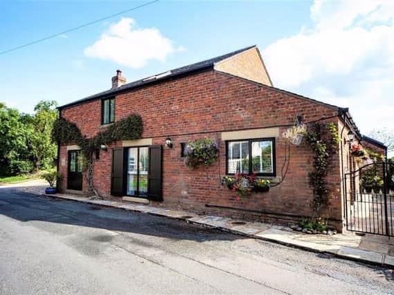On the market for565,000 with Dewhurst Homes, Old Cuddy Cottage is a stunning converted barn.