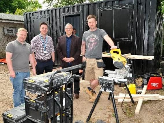 The creators of 'Chorley Shed' at the opening of the project at Victory Park, Chorley, from left, David Murphy, Lewis Smith-Connell, John Hill and Simon Denham
