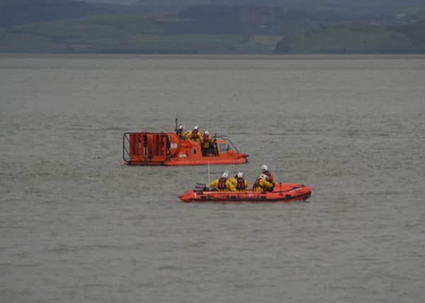 Morecambe RNLI hovercraft and inshore lifeboat.