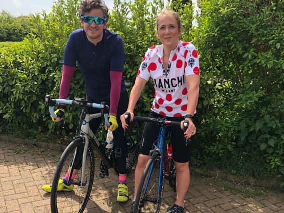 Forbes staff Jonathan Holden with Rosalind Leahy are two of the 35-strong team do take on Tour de Forbes for St Catherine's Hospice in Lostock Hall