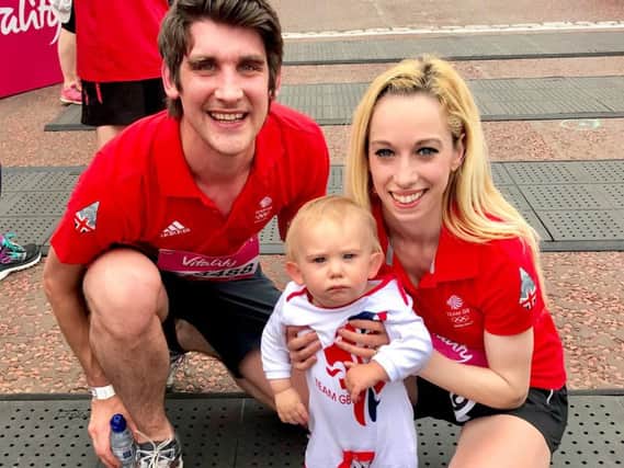 Olympic figure skaters ran a mile with their 10-month-old baby to inspire young athletes to follow their dreams.