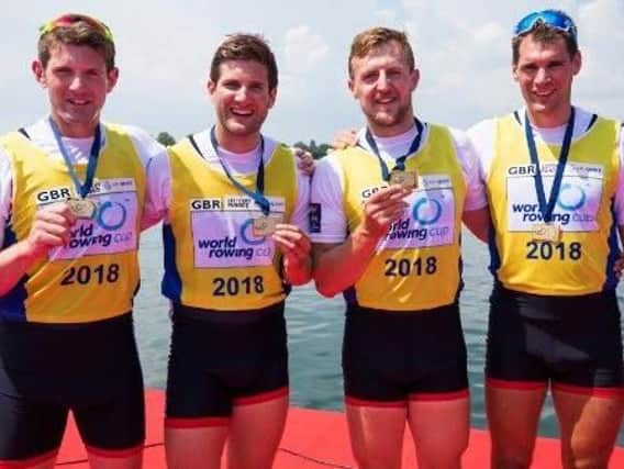 Graeme Thomas with his quadruple scull team-mates after winning gold