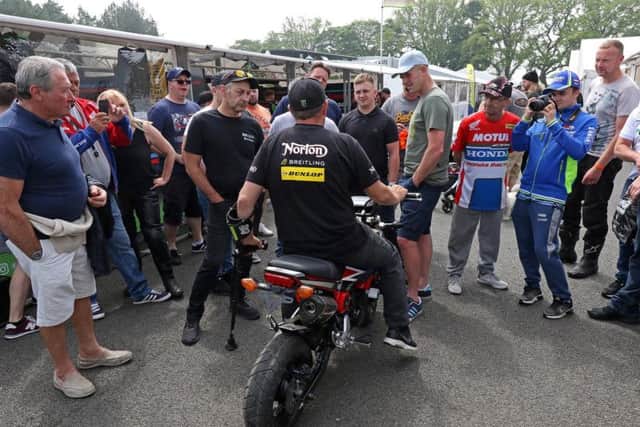 McGuinness chats to fans in the TT paddock. Picture: Rod Neill