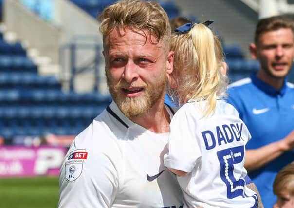 Tom Clarke with daughter Heidi after PNE's victory over Burton on the final day of last season