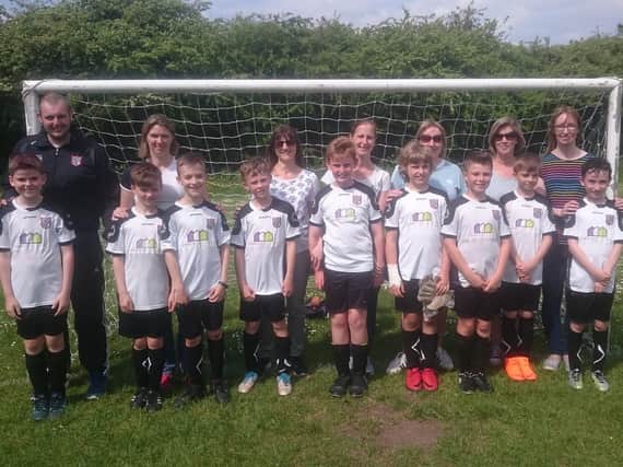Members of  New Longton Rovers U10 Blacks who are doing Race for Life in Preston to support head coach Andy Nicholls