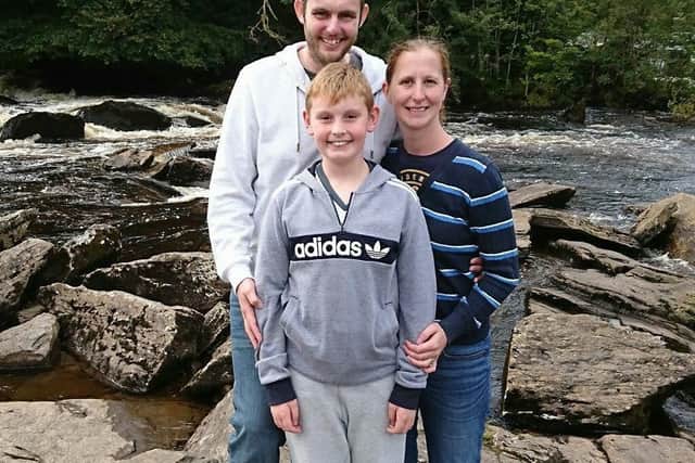 Andy Nicholls, of Ingol, who has oesophageal cancer, with his son Ryan and wife Claire