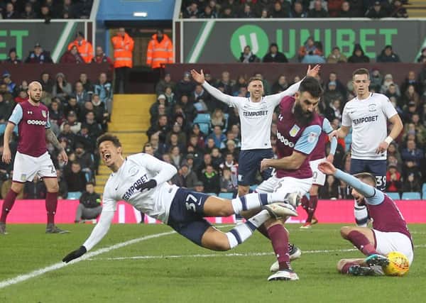 Callum Robinson goes to ground during PNE's clash with Aston Villa in February