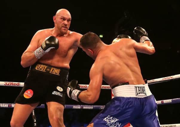 Tyson Fury (left) and Sefer Seferi during the international heavyweight bout at the Manchester Arena