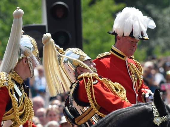 Field Marshal Lord Guthrie of Craigiebank (centre), the former head of the armed forces, who is in hospital after falling from his horse following the Trooping the Colour ceremony. Photo: Peter Summers/PA Wire