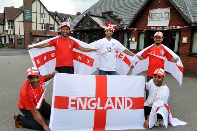 Photo Neil Cross
The staff at Hutton's Indian restaurant the Sylhet Bangla are getting ready for the World Cup and giving special offers for England games - even free meals to some fans