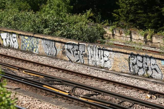 Graffiti on a railway line near Loughborough Junction railway station