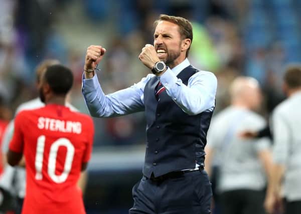 England manager Gareth Southgate celebrates their win after the final whistle in Volgograd.