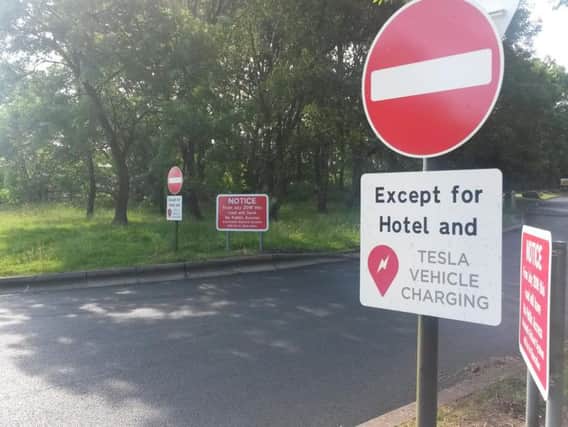 Signs have popped up around two access routes off Mill Lane