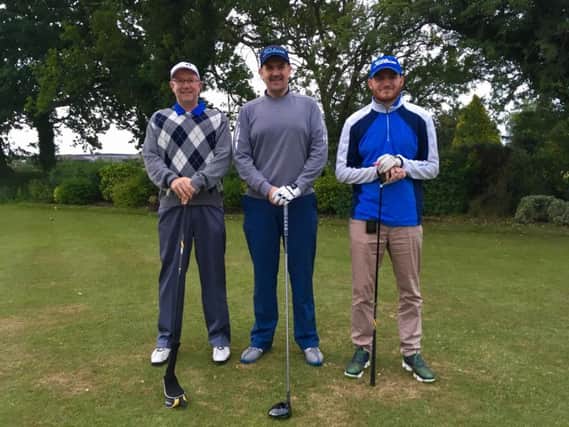 Richard Simms, James Eastham and Andrew Crossley from ROQ in Chorley who held a golf day for Macmillan Cancer Support