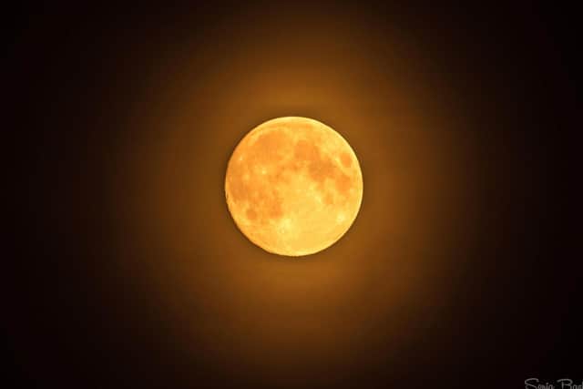 The moon over Lancashire turned blood red after moorland fires raged across the North West PIC: Sonia Bashir