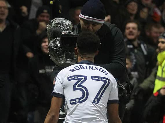 Callum Robinson celebrates in front of the TV cameras when PNE played against Arsenal in January 2017