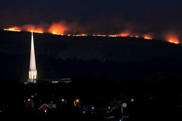 Winter Hill from Buckshaw Village on Thursday night as fires raged throughout the evening