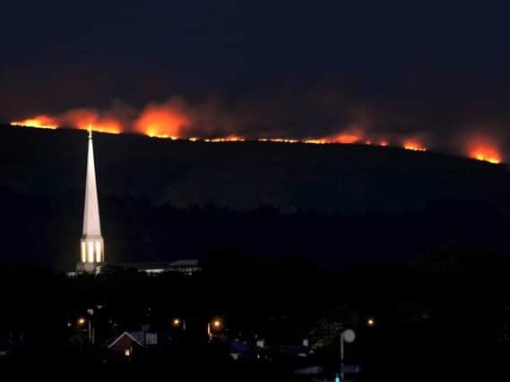 Winter Hill from Buckshaw Village on Thursday night as fires raged throughout the evening