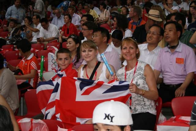 Sophie Ward at the Olympics in Beijing at the age of 14 with her family
