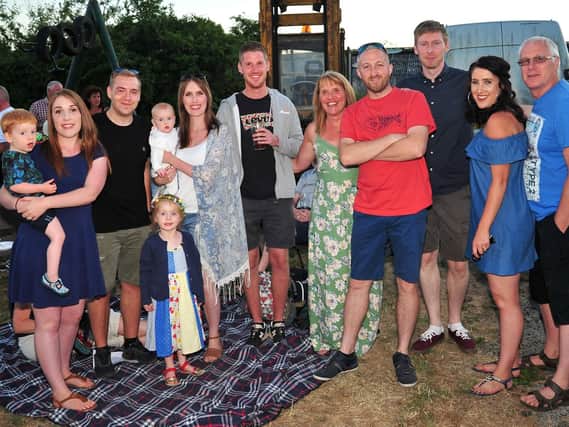 Family and friends gather at the beer and music festival