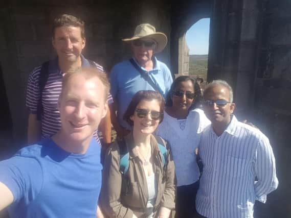 Rosemere Cancer Foundations Dan Hill, supporters David Bristol, John Hacking and Maria Adamson with Dr Jeyaram and Mrs Krishna Srinivasan on a training trek to Darwen Tower