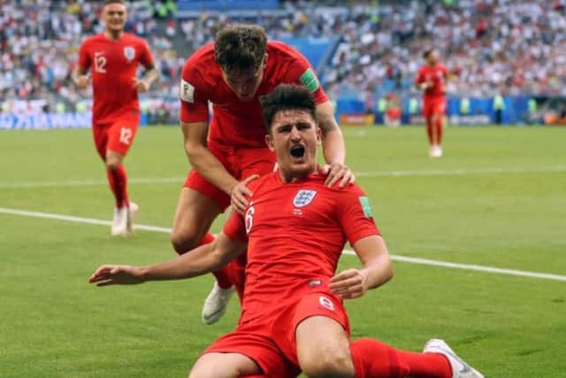 Harry Maguire celebrates putting England in front in their last eight clash with Sweden.