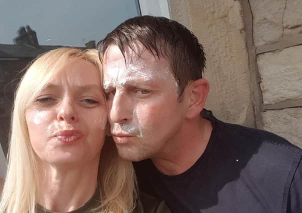 Karen Byrne and husband Arthur doing their "suncream selfie".
Karen, 45, was diagnosed with skin cancer at the age of 30 after spotting a tiny mole which looked strange at the back of her leg and mentioning it to her GP. It ended up being malignant melanoma and she had to have surgery to remove part of her leg.
Since then, she has had 30 moles removed.