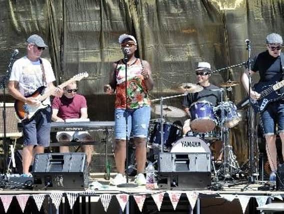 Group Relative Cool perform at Our Lady's Festi-ful