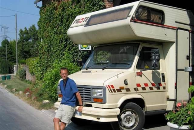 Tony and the camper van he lived in during his travels