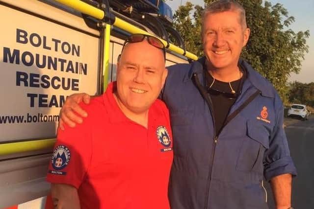 Alistair Grenhough of Bolton Mountain Rescue team (left) and