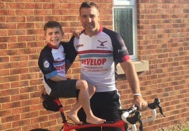 Jack with dad Andy, who is a former Wigan Warriors star himself.