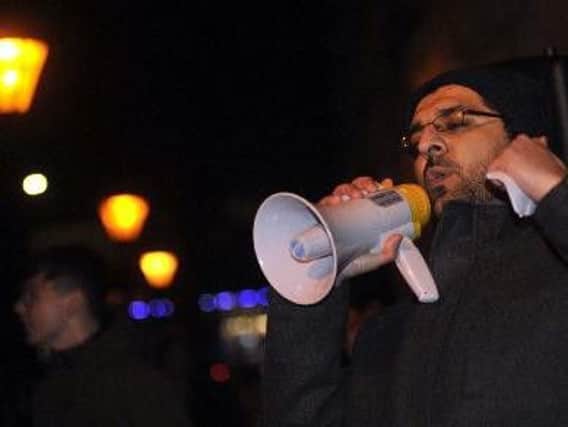Nadeem Ashfaq speaking in 2017 at a demonstation in Preston against US president Donald Trumps ban on immigration from Muslim countries