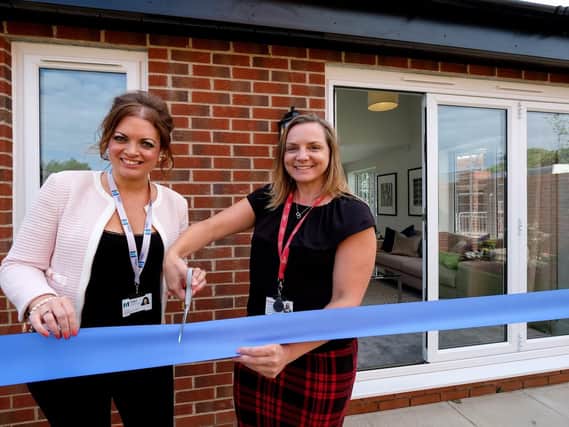 Gill Kelly (Managing Director of M&Y Maintenance and Construction) and Fiona Coventry (Managing Director of Redwing Living) cut the ribbon of ther new development at Bluebrook in Hambleton