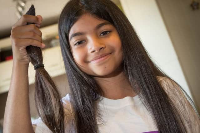 Gone.... Sehr with the 15-inches of hair which is going to charity
