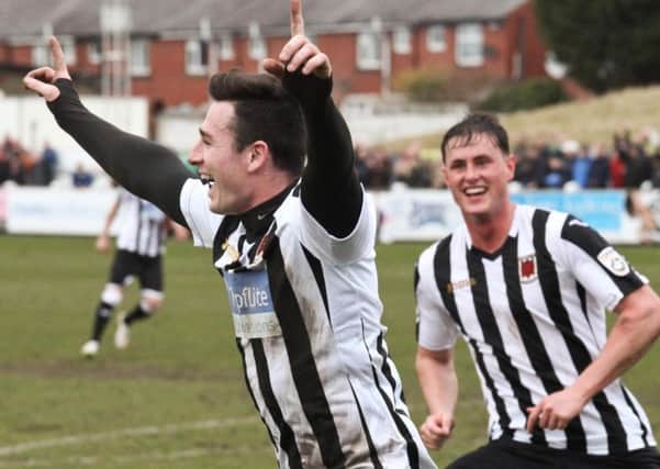 Josh Hine celebrates after scoring his hat-trick for Chorley. Chorley 6 Tamworth 0 - Conference North - Saturday, March 28, 2015