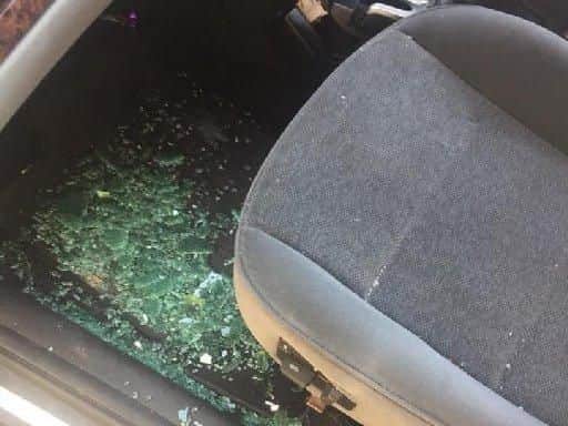 Damage left in the car after stone hit the passenger side window