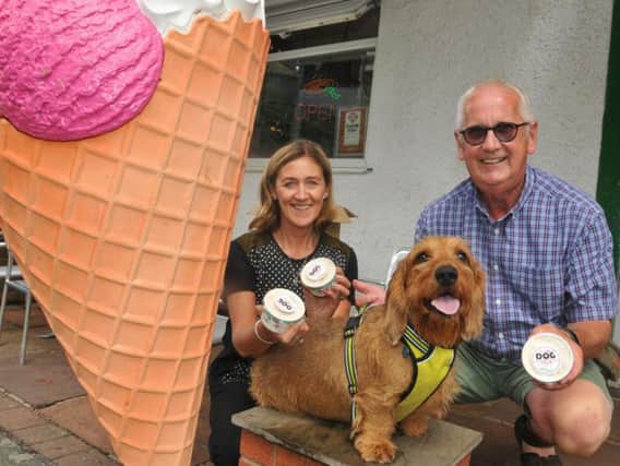 Fredericks managing director Donna Townson at the ice cream parlour in Bolton Road, Chorley, with regular customers Paul Wren and Murphy