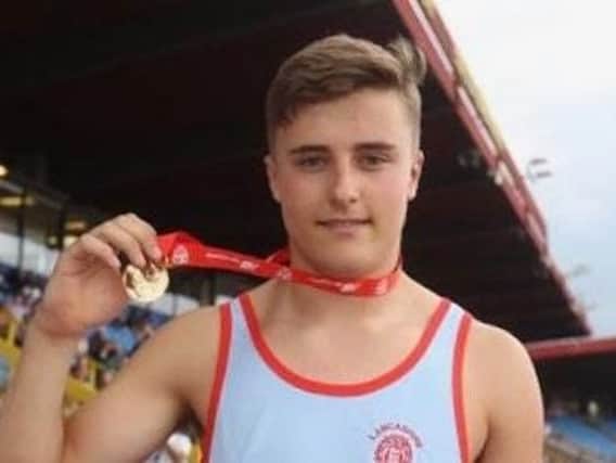 Sam Gaskell with his gold medal