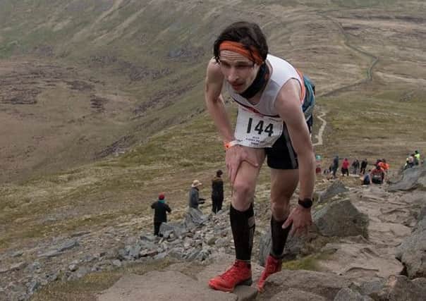 Chris Holdsworth in action at the Three Peaks fell race