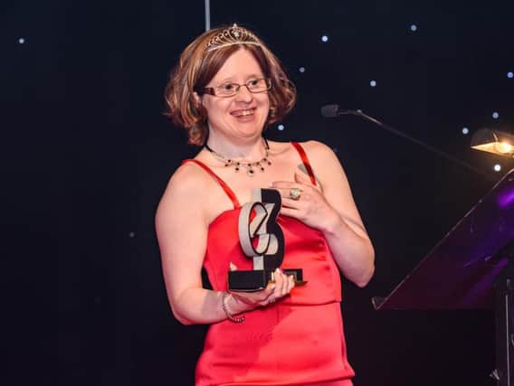 DanceSyndrome founder Jen Blackwell with the award