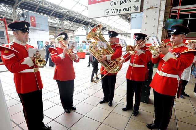A band playing at the station