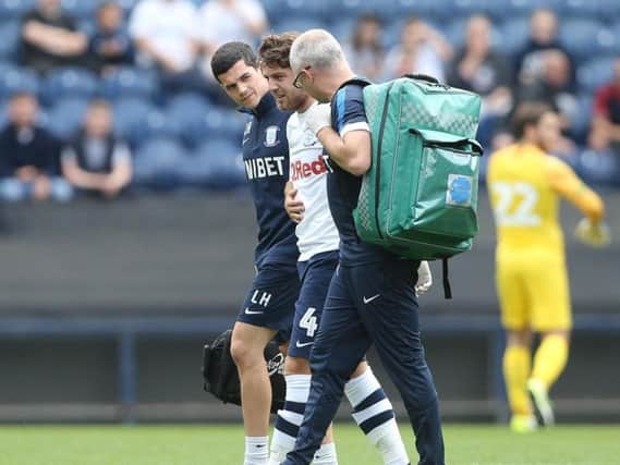 Ben Pearson being helped off after getting a knock in his ribs against West Ham