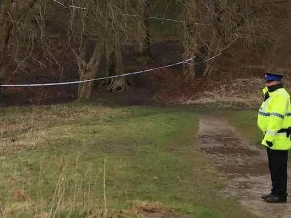 The baby's body was found in woodland in Heywood, Greater Manchester
