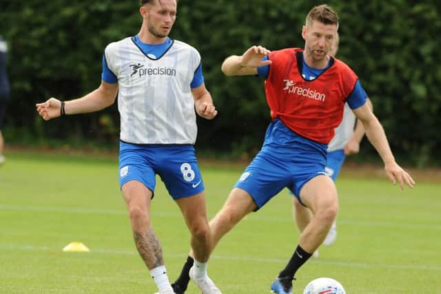 Browne and Paul Gallagher in action during pre-season training