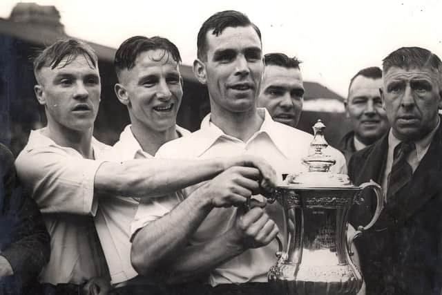 Bill Shankly, left, with PNE teammates after winning the 1938 FA Cup