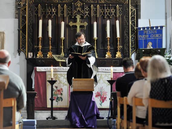 The Vicar of Preston, The Ven Michael Everitt, Archdeacon of Lancaster, leading the requiem mass with the remains present in front of him