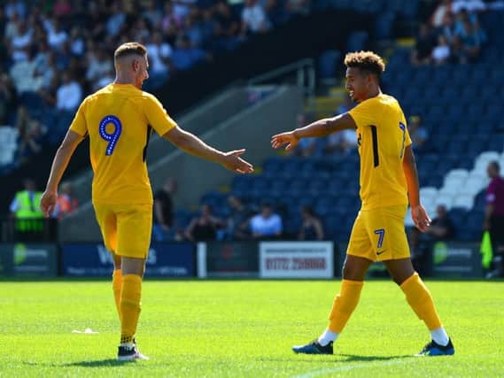 Louis Moult  and Callum Robinson will hope to be in the goals for PNE this season