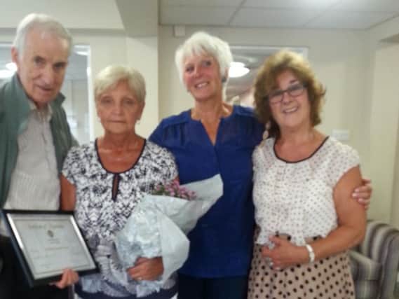 Chorley Lions Tony Ratcliffe, Velma Boulter and President Barbara Morgan present Moira with flowers and a certificate of appreciation and thanks.